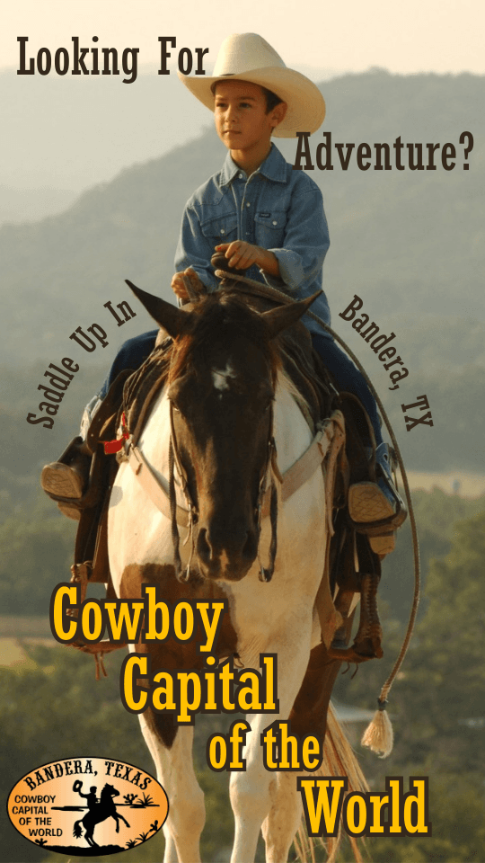 Vertical ad. A boy in a white cowboy hat rides a paint horse at golden hour above a green valley. Text reads “Looking For Adventure? Saddle Up In Bandera, TX — Cowboy Capital of the World.”